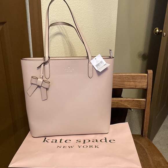 kate spade Handbags - NWT ♠️ kate spade Brynn Tote with Bow Charm & Free KS Earrings if still avail!